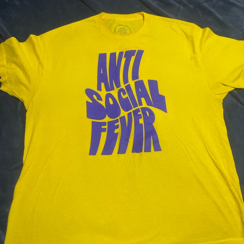 Vibrant Yellow Tee with Bold Purple Graphic
